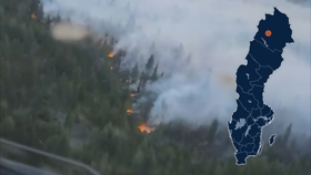 Skogsbrand väglöst land