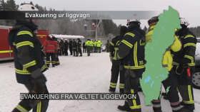 Evakuering fra væltet liggevogn.