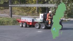 Motoriserad mobil slangupprullare för skogsbränder